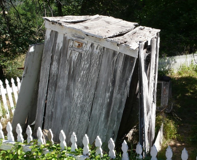 Outhouse before
